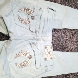 Mint green winged Miss Me skinny jeans size 25